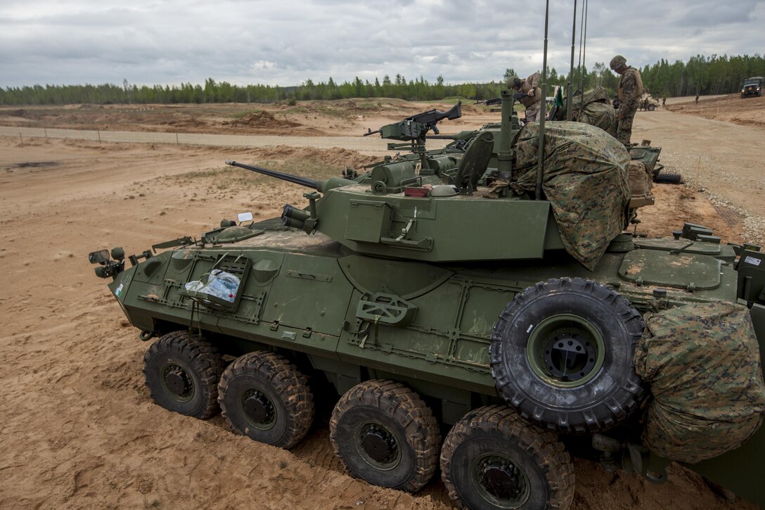 ADAZI, Latvia - Marines with Charlie Company, 4th Light Armored Reconnaissance Battalion, 4th Marine Division, Marine Forces Reserve, conduct the firing of Light Armored Vehicles during Exercise Saber Strike 17 in the Adazi Training Area, Latvia, June 5, 2017. Exercise Saber Strike 17 is an annual combined-joint exercise conducted at various locations throughout the Baltic region and Poland. The combined training exercise keeps Reserve Marines ready to respond in times of crisis by providing them with unique training opportunities outside the continental United States. (U.S. Marine Corps photo by Lance Cpl. Ricardo Davila/Released)