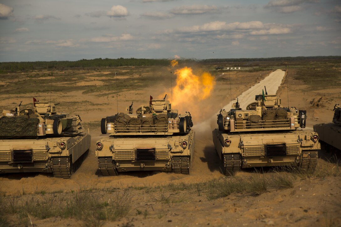 ADAZI, Latvia – Marines with Alpha Company, 4th Tank Battalion, 4th Marine Division, Marine Forces Reserve, fire from a M1 Abrams tank during Exercise Saber Strike 17 in the Adazi Training Area, Latvia, June 4, 2017. Exercise Saber Strike 17 is an annual combined-joint exercise conducted at various locations throughout the Baltic region and Poland. The combined training exercise keeps Reserve Marines ready to respond in times of crisis by providing them with unique training opportunities outside of the continental United States. (U.S. Marine Corps photo by Cpl. Devan Alonzo Barnett/Released)