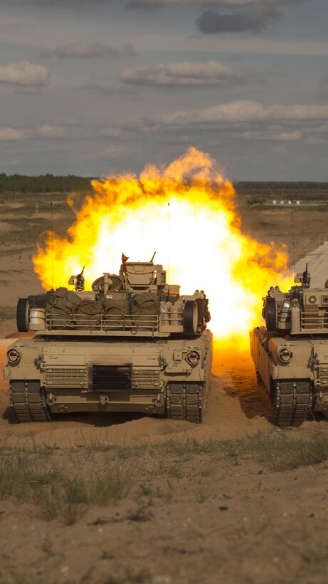 ADAZI, Latvia – Marines with Alpha Company, 4th Tank Battalion, 4th Marine Division, Marine Forces Reserve, fire from a M1 Abrams tank during Exercise Saber Strike 17 in the Adazi Training Area, Latvia, June 4, 2017. Exercise Saber Strike 17 is an annual combined-joint exercise conducted at various locations throughout the Baltic region and Poland. The combined training exercise keeps Reserve Marines ready to respond in times of crisis by providing them with unique training opportunities outside of the continental United States. (U.S. Marine Corps photo by Cpl. Devan Alonzo Barnett/Released)