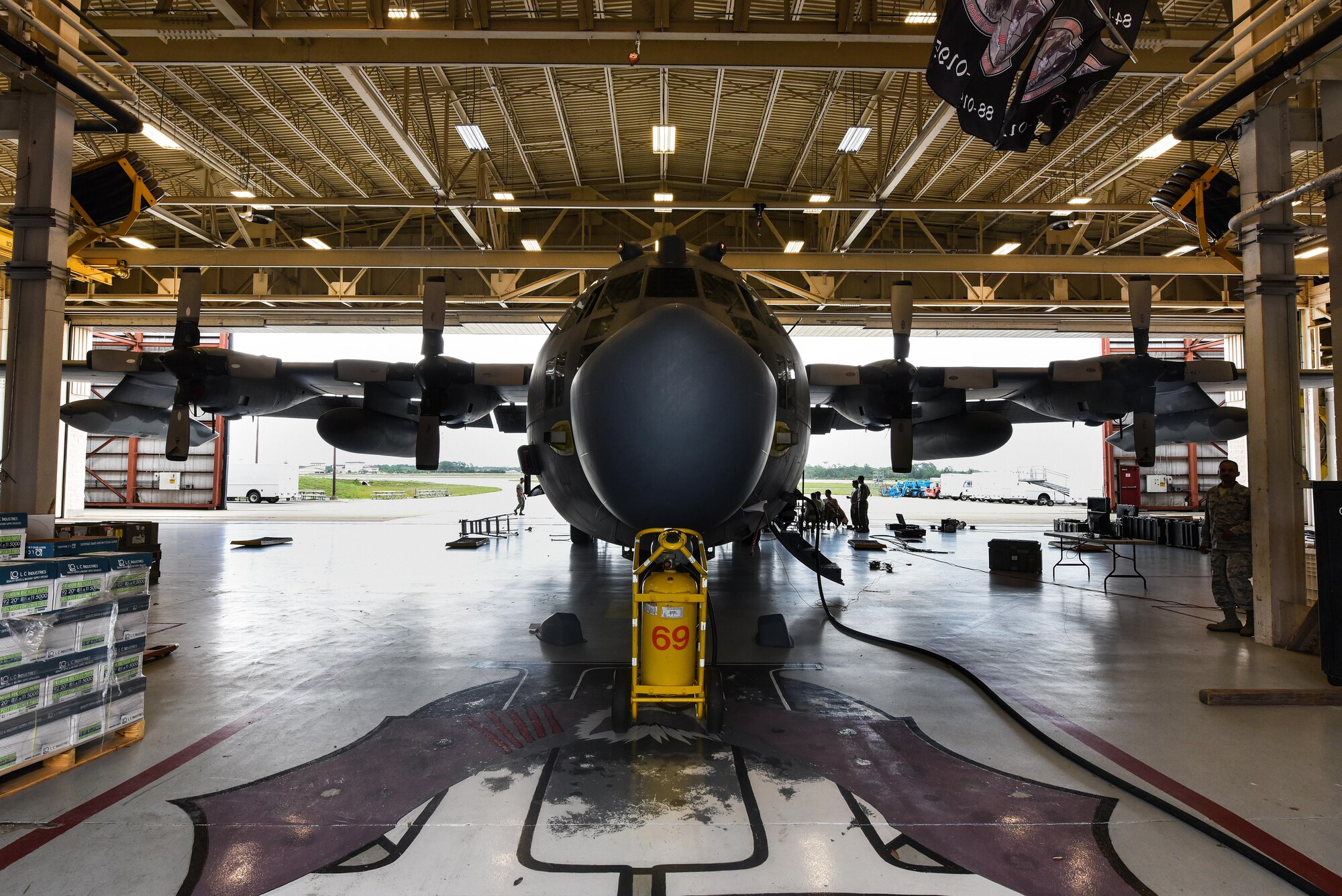 Airmen with the 15th Aircraft Maintenance Unit prepare an MC-130H Combat Talon II for routine maintenance at Hurlburt Field, Fla., June 7, 2017. The Combat Talon II provides infiltration, exfiltration and resupply of special operations forces and equipment in hostile or denied territory. Secondary missions include psychological operations and helicopter and vertical lift air refueling. (U.S. Air Force photo by Staff Sgt. Jeff Parkinson)