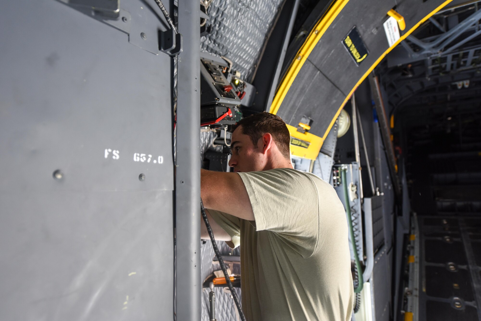 Airman 1st Class Anthony Hause, an electronic warfare journeyman with the 15th Aircraft Maintenance Unit, reassembles waveguide systems on an MC-130H Combat Talon II at Hurlburt Field, Fla., June 7, 2017. Electronic warfare specialists perform the USM670A test on the MC-130H Combat Talon II which ensures the radar jamming system produces the proper signals to prevent aircraft detection while in flight. (U.S. Air Force photo by Staff Sgt. Jeff Parkinson)