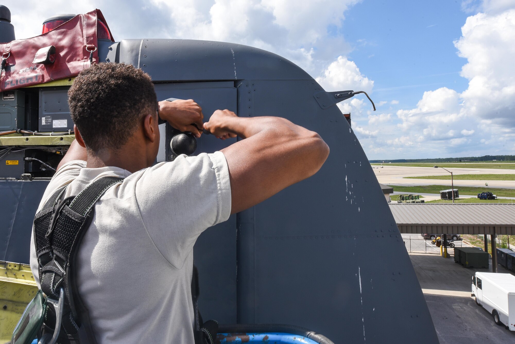 Airman 1st Class William Green, an electronic warfare specialist with the 15th Aircraft Maintenance Unit, re-installs an antenna mount on an MC-130H Combat Talon II during routine maintenance at Hurlburt Field, Fla., June 7, 2017. The antenna allows the aircraft to read and interpret different signals allowing the radar jammer to produce the correct signals and effectively prevent aircraft detection while in flight. (U.S. Air Force photo by Staff Sgt. Jeff Parkinson)