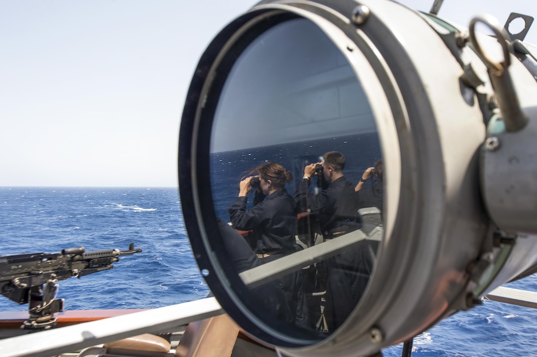 Naval Academy midshipmen aboard the USS Carney look for surface contacts before a live-fire gunnery exercise in the Mediterranean Sea, June 8, 2017. The Carney is on patrol in the U.S. 6th Fleet area of responsibility supporting U.S. national security interests in Europe. Navy photo by Petty Officer 3rd Class Weston Jones