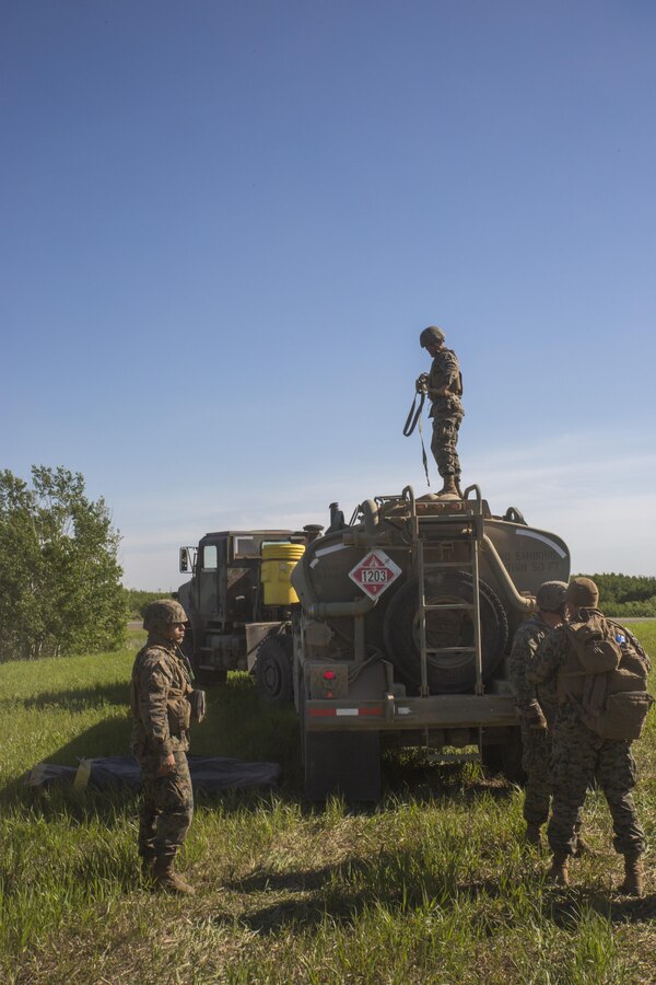 Marines with Marine Wing Support Squadron 473, 4th Marine Aircraft Wing, Marine Forces Reserve, operate a forward arming and refueling point for Royal Canadian Air Force CH-147 Chinook and CH-146 Griffon type model series at the Canadian Manoeuvre Training Centre, Camp Wainwright in Alberta, Canada, May 30, 2017. Exercise Maple Flag prepares international aircrew, maintenance and support personnel for the rigours of operations in the modern aerial battlespace. (U.S. Marine Corps Photo by Lance Cpl. Niles Lee)