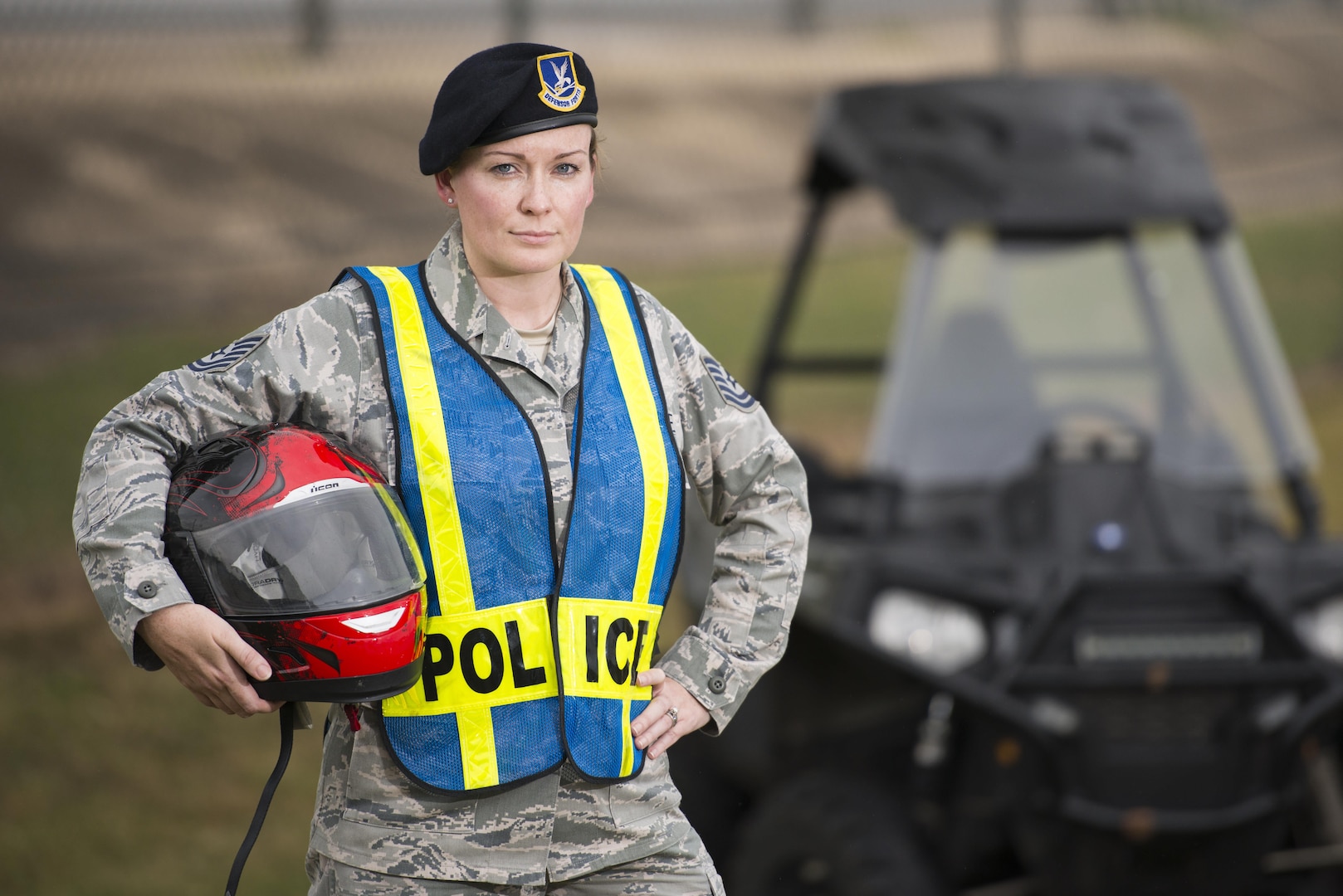 Technical Sgt. Michelle Aberle, 802nd Security Forces Squadron installation security, poses for a photo prior to conducting a security check May 9, 2017, at Joint Base San Antonio-Lackland, Texas.  Aberle and Turner provide force protection for base personnel, equipment and facilities from threats to include intrusion by unauthorized people. (Photo by Sean Worrell)