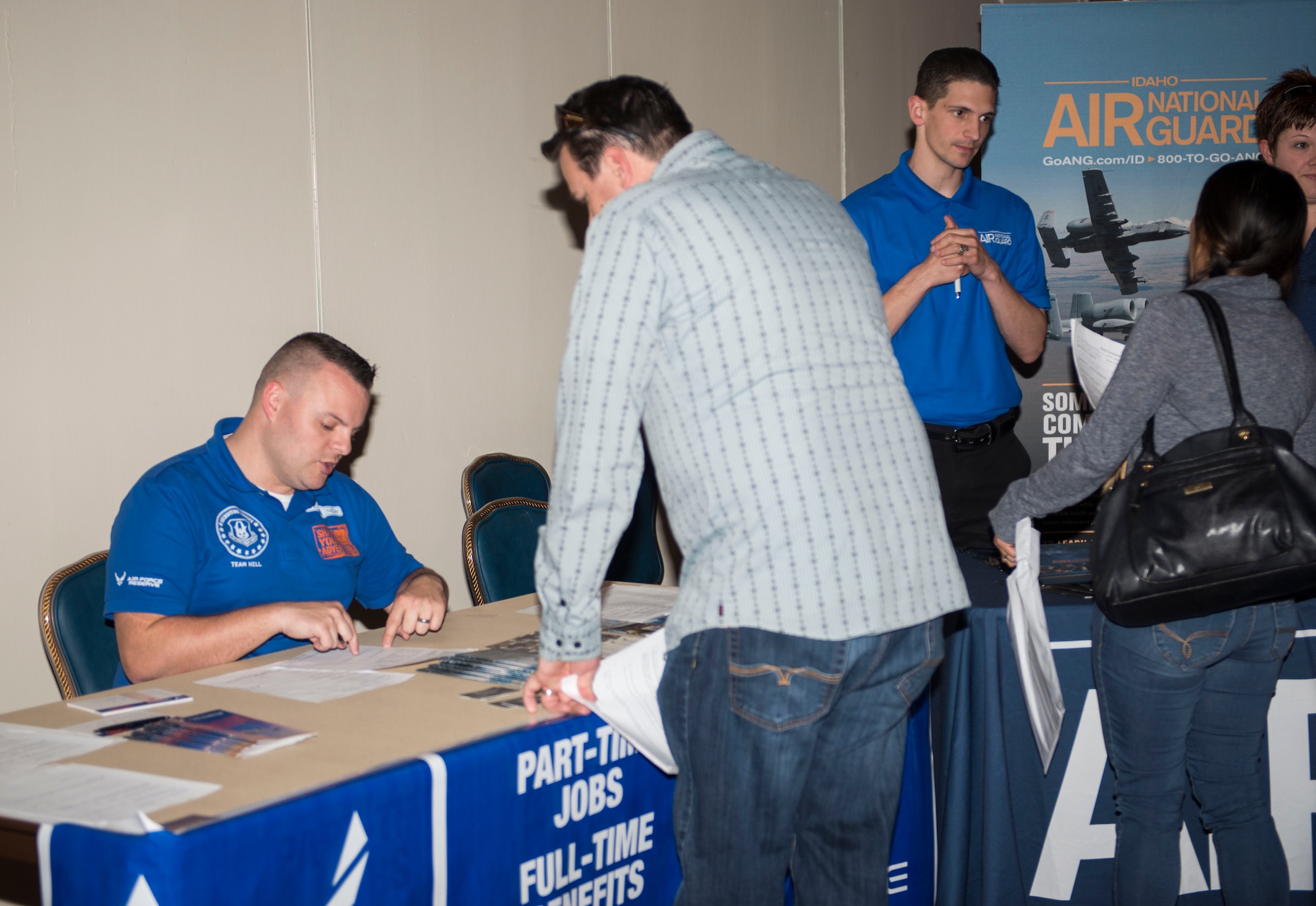 A participant speaks to a recruiter during an Inactive Ready Reserve Muster, June 2, 2017, at Mountain Home Air Force Base, Idaho. Individuals who served their obligation to the military are put on inactive status in the case of a national emergency or war. (U.S. Air Force photo by Senior Airman Malissa Lott/Released)