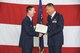 170603-Z-BD327-068: U.S. Air Force Col. Daniel Skotte, the commander of the146th Airlift Wing Medical Group, accepts his certificate of retirement from Brig. Gen. Clay Garrison, the commander of the California Air National Guard, at Kingsley Field, June 3, 2017. Skotte tallies just days short of a full 50 years of service and is likely the longest serving Airman to date. (U.S. Air National Guard photo by Senior Airman Riley Johnson)
