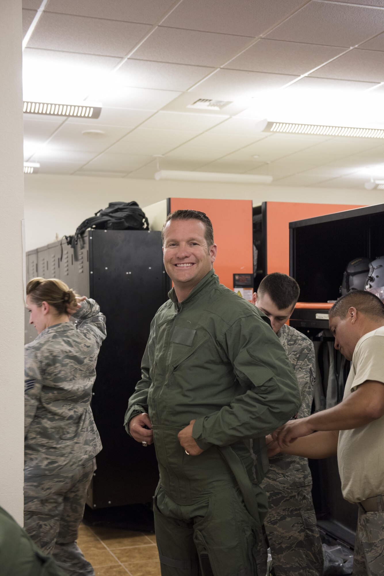 Rich Sykes, Mountain Home mayor, gets fitted for his flight suit June 1, 2017, at Mountain Home Air Force Base, Idaho. This was Sykes first time flying in an F-15E Strike Eagle.(U.S. Air Force Photo by Senior Airman Jeremy L. Mosier)