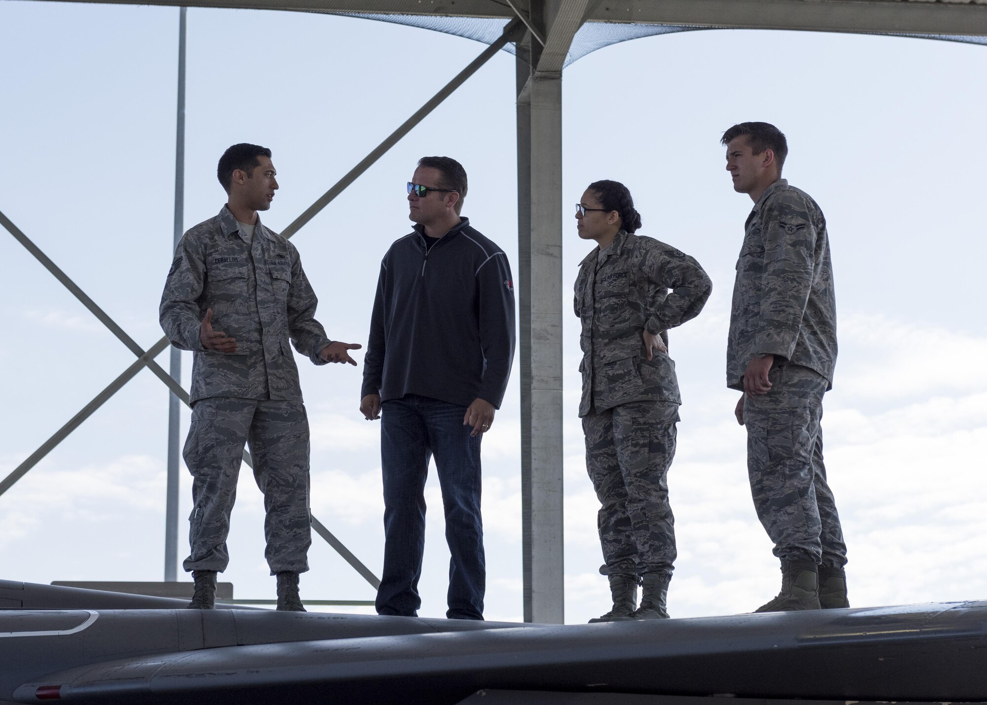 Maintenance airmen discuss their jobs with Rich Sykes, Mountain Home mayor, June 2, 2017, at Mountain Home Air Force Base, Idaho. Sykes experienced first-hand all the moving parts that work together to produce a sortie.(U.S. Air Force Photo by Senior Airman Jeremy L. Mosier)