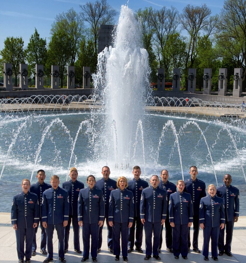The U.S. Air Force Singing Sergeants perform at the World War ll Memorial during the recording of the nation anthem video project. The video was produced in cooperation with U.S. Air Force Television for release in base movie theaters across the globe. (Photo by Chief Master Sgt. Bob Kamholz)

