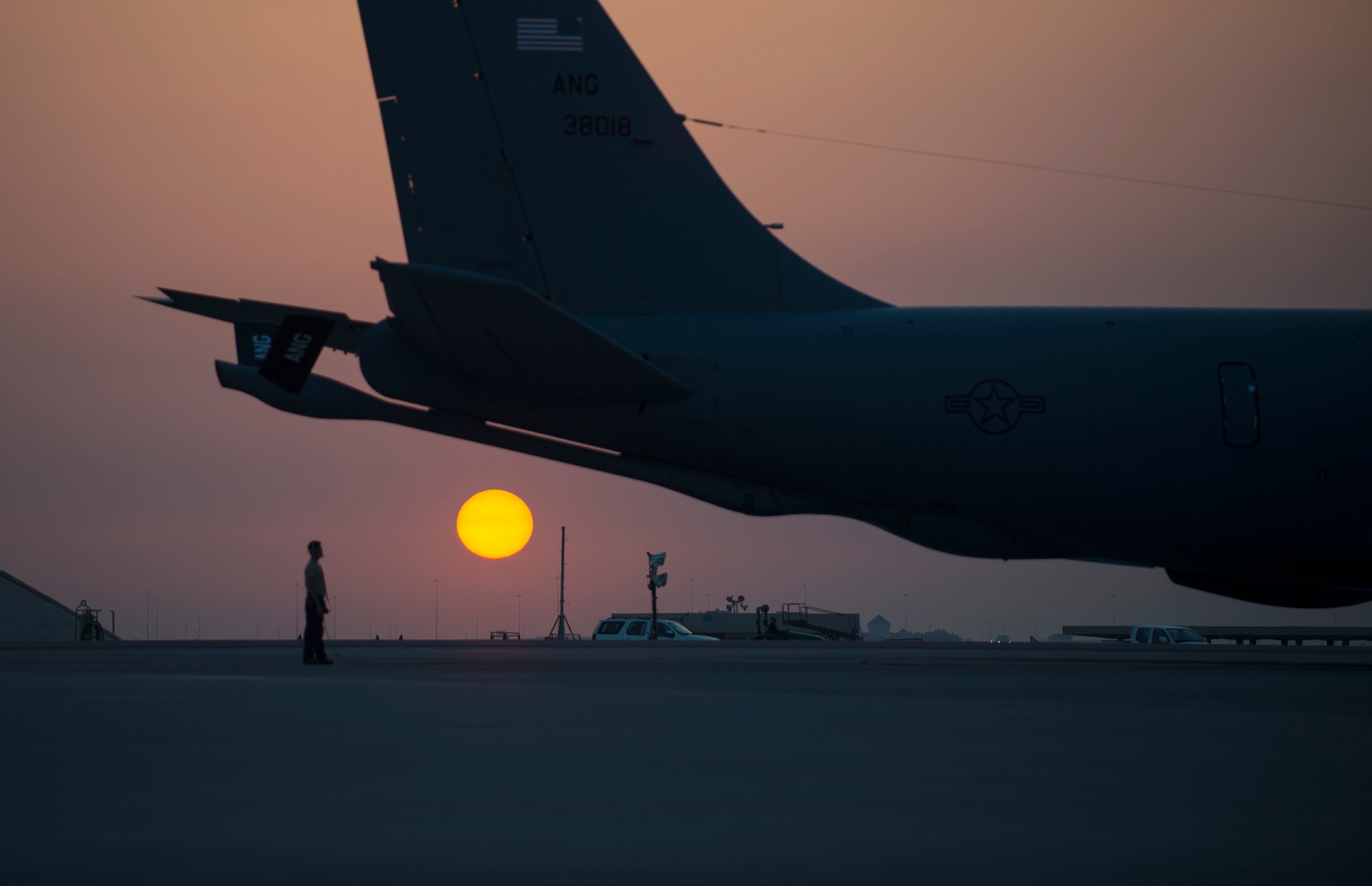 A U.S. Air Force Airman with the 379th Expeditionary Aircraft Maintenance Squadron wait to conduct a pre-flight check on a KC-135 Stratotanker at Al Udeid Air Base, Qatar, June 8, 2017. The inspection being performed on one of the KC-135 Stratotanker is accomplished on a regular schedule in order keep the aircraft mission ready. (U.S. Air Force photo by Tech. Sgt. Amy M. Lovgren)