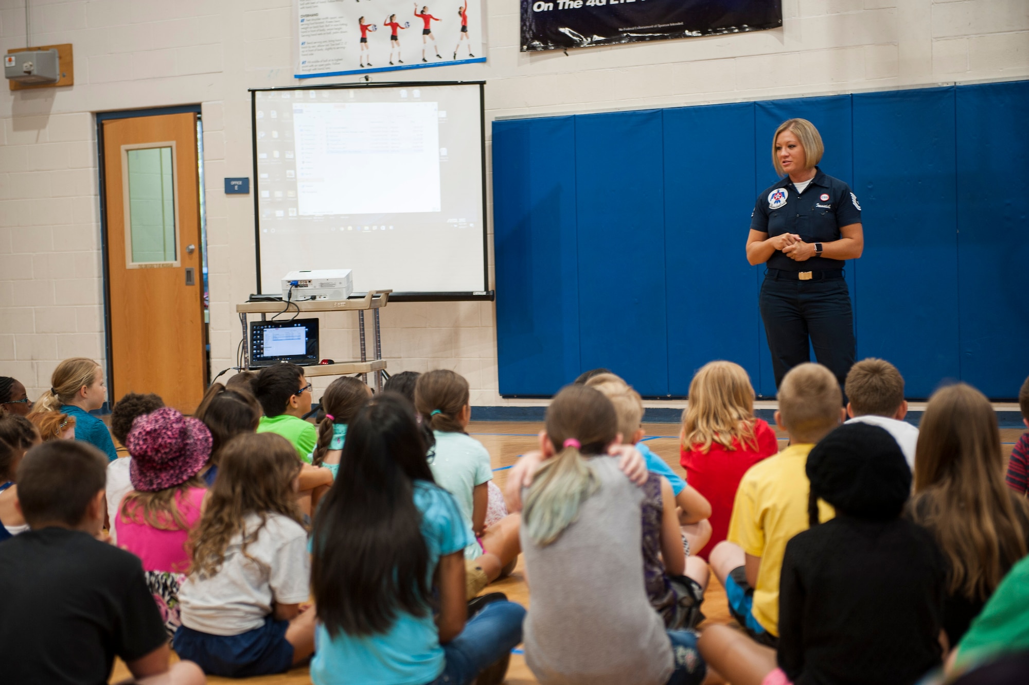 Tech. Sgt. Heather Toussaint, Thunderbirds personnel specialist,  speaks to military children at Scott Air Force Base, Ill., June 9, 2017. Toussaint performs administrative duties for the United States Air Force Thunderbirds. (U.S. Air Force photo by Staff Sgt. Clayton Lenhardt)