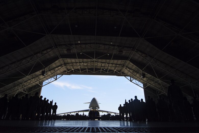 Reservists from the 512th Airlift Wing stand in formation June 10, 2017, during the wing's change of command ceremony at Dover Air Force Base, Delaware. Col.Craig C. Peters assumed command of the 512th AW. (U.S. Air Force photo/Senior Airman Damien Taylor)