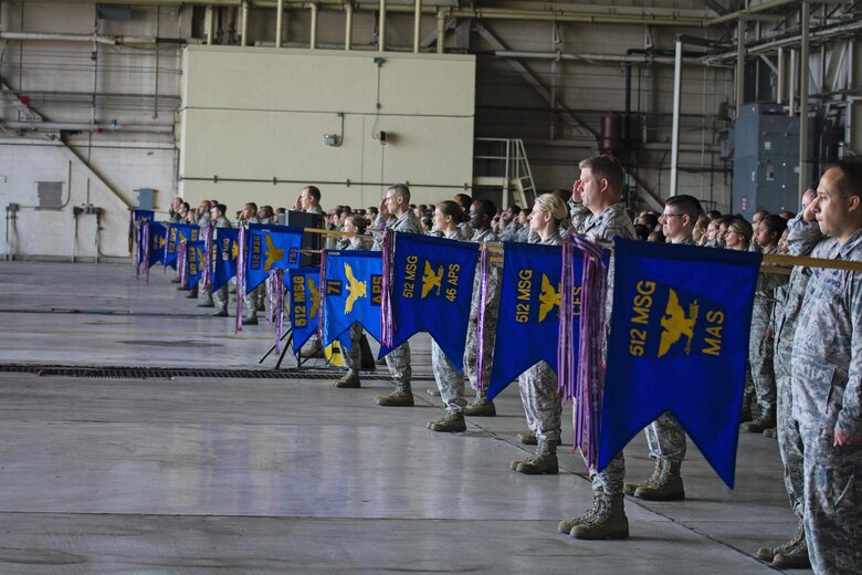 Reservists from the 512th Airlift Wing stand in formation June 10, 2017, during the wing's change of command ceremony at Dover Air Force Base, Delaware. Col.Craig C. Peters assumed command of the 512th AW. (U.S. Air Force photo/Senior Airman Damien Taylor)