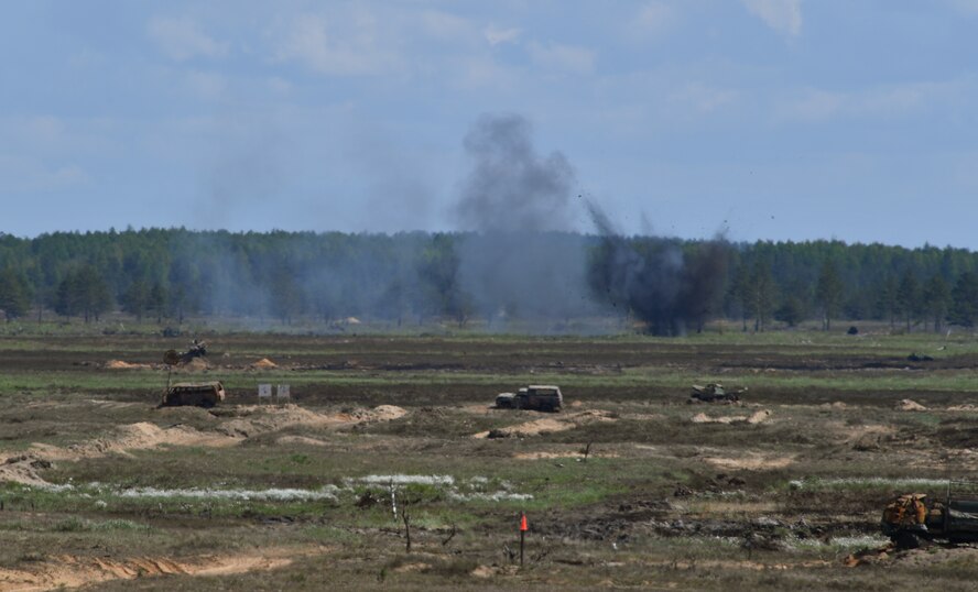 An explosion goes off on a range during exercise Saber Strike 17 at Adazi Military Base, Latvia, June 9, 2017. U.S. and NATO joint terminal attack controllers coordinated air assaults from U.S. Air Force F-16 Fighting Falcons, a B-52 Stratofortress, and a B-1B Lancer during the exercise. Saber Strike 17 highlights the inherent flexibility of ground and air forces to rapidly respond to crises allowing for the right presence where it is needed, when it is needed.  (U.S Air Force photo by Senior Airman Tryphena Mayhugh)