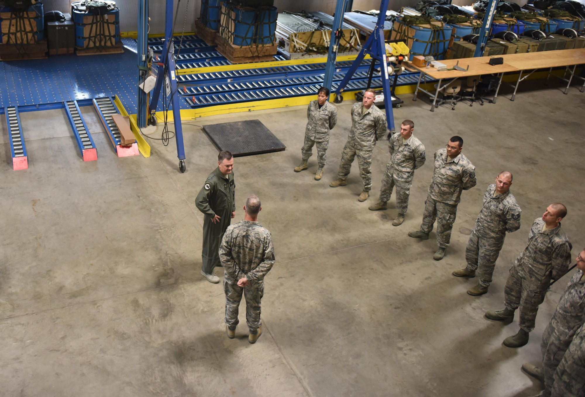 U.S. Air Force Lt. Gen. Brad Webb (top), commander of Air Force Special Operations Command, concludes his tour June 10, 2017, with a stop at the 193rd Special Operations Logistics Readiness Squadron, Middletown, Pennsylvania. Webb and Tech. Sgt David Martin, a load planner with the 193rd LRS, discuss how 193rd Special Operations Wing Airmen play a key role in the Emerald Warrior Exercise every year. (U.S. Air National Guard photo by Senior Airman Julia Sorber/Released)