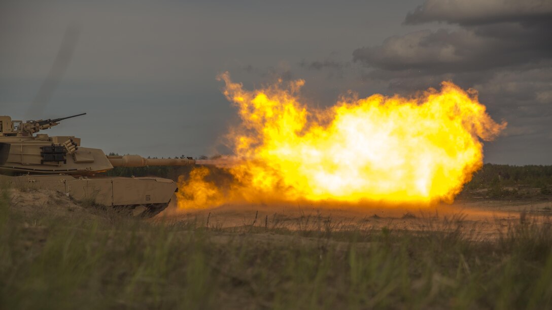 Marines with Alpha Company, 4th Tank Battalion, 4th Marine Division, Marine Forces Reserve, fire from a M1 Abrams tank during Exercise Saber Strike 17 in the Adazi Training Area, Latvia, June 4, 2017. Exercise Saber Strike 17 is an annual combined-joint exercise conducted at various locations throughout the Baltic region and Poland. The combined training exercise keeps Reserve Marines ready to respond in times of crisis, by providing them with unique training opportunities outside of the continental United States.