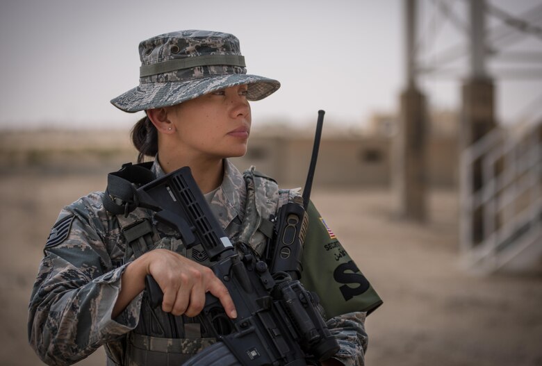 U.S. Air National Guard Tech. Sgt. Casey Morrison, a patrol team lead with the 407th Expeditionary Security Forces Squadron,pauses during a patrol on base May 13, 2017, in Southwest Asia. Morrison is a member of the 254th Security Forces Squadron at Andersen Air Force Base, Guam, and deployed to the Air Force Central Command region in support of Operation Inherent Resolve.  She provides integrated base defense by performing base patrols and gate guard duties in defense of personnel assigned to the 407th Air Expeditionary Group. (U.S. Air Force photo by Staff Sgt. Alexander W. Riedel)