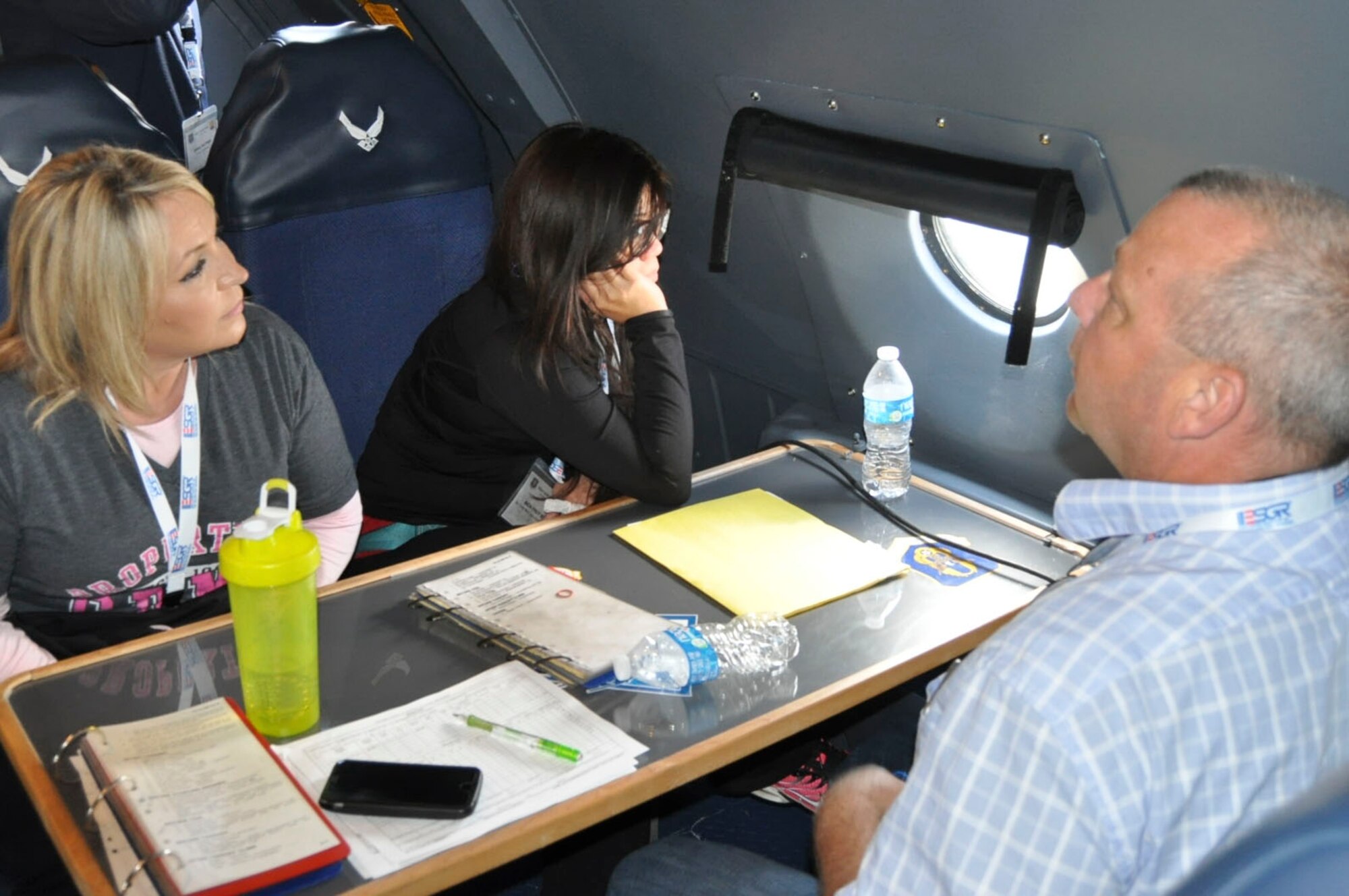 (Left) Janelle Walker-Tharp, Guadalupe Regional Medical Center, Bich-Thuy Sim, Air Force Medical Operations Agency, and Chad Scanlon, Amtrak (Fort Worth branch), all enjoy the ride and the view of the coastline of Texas in a C-5M Super Galaxy during the 433rd Airlift Wing’s Boss Lift June 10, 2017. Twenty-eight civilian employers of 433rd Airlift Wing Airmen were provided an opportunity to experience the Alamo Wing’s mission from the sky. (U.S. Air Force photo/Senior Airman Bryan Swink)