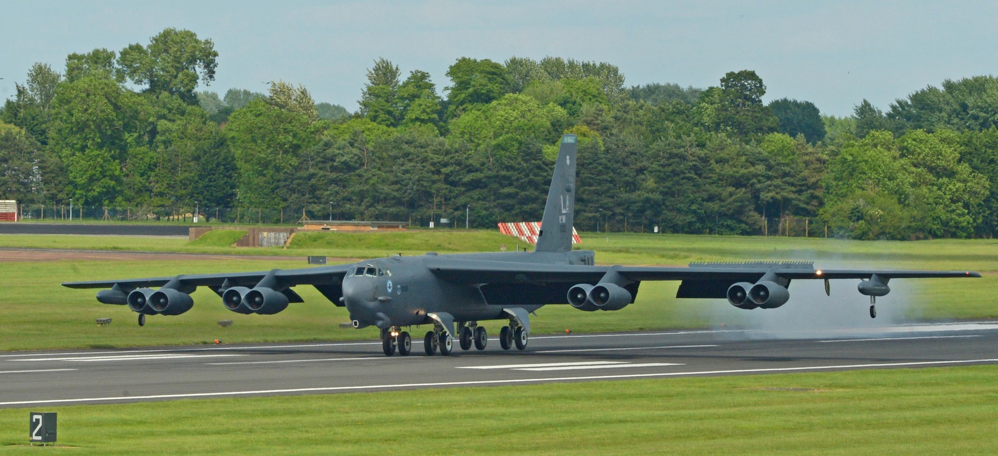 A B-52H Stratofortress from Barksdale Air Force Base, La., lands at Royal Air Force Fairford, United Kingdom, June 1, 2017. The B-52 returned from a mission in support of exercise Arctic Challenge, a two-week multinational training exercise that included live-flying events to train on offensive and defensive air combat operations. Training with allies and joint partners improves coordination between allies and enables the U.S. Air Force to build enduring relationships necessary to confront a broad range of global challenges. (U.S. Air Force photo/Senior Airman Curt Beach)