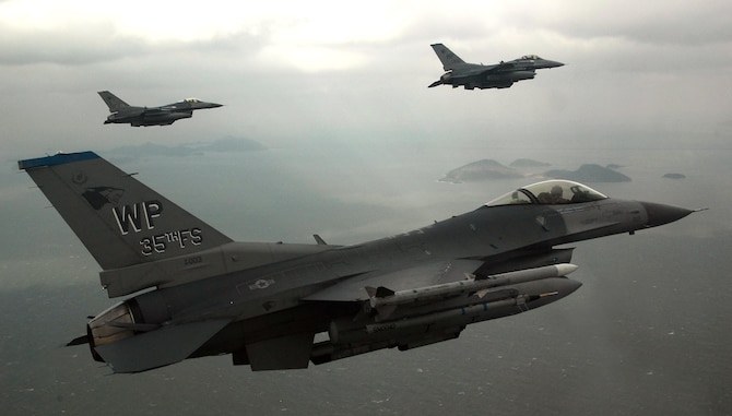 Pilots from the 35th Fighter Squadron conduct a training mission over the South Korean peninsula. Pilots assigned to the 35th FS utilize training missions to simulate actual conditions they may face in combat and keep their war-fighting skills honed. (U.S. Air Force Photo/Tech. Sgt Quinton T. Burris)