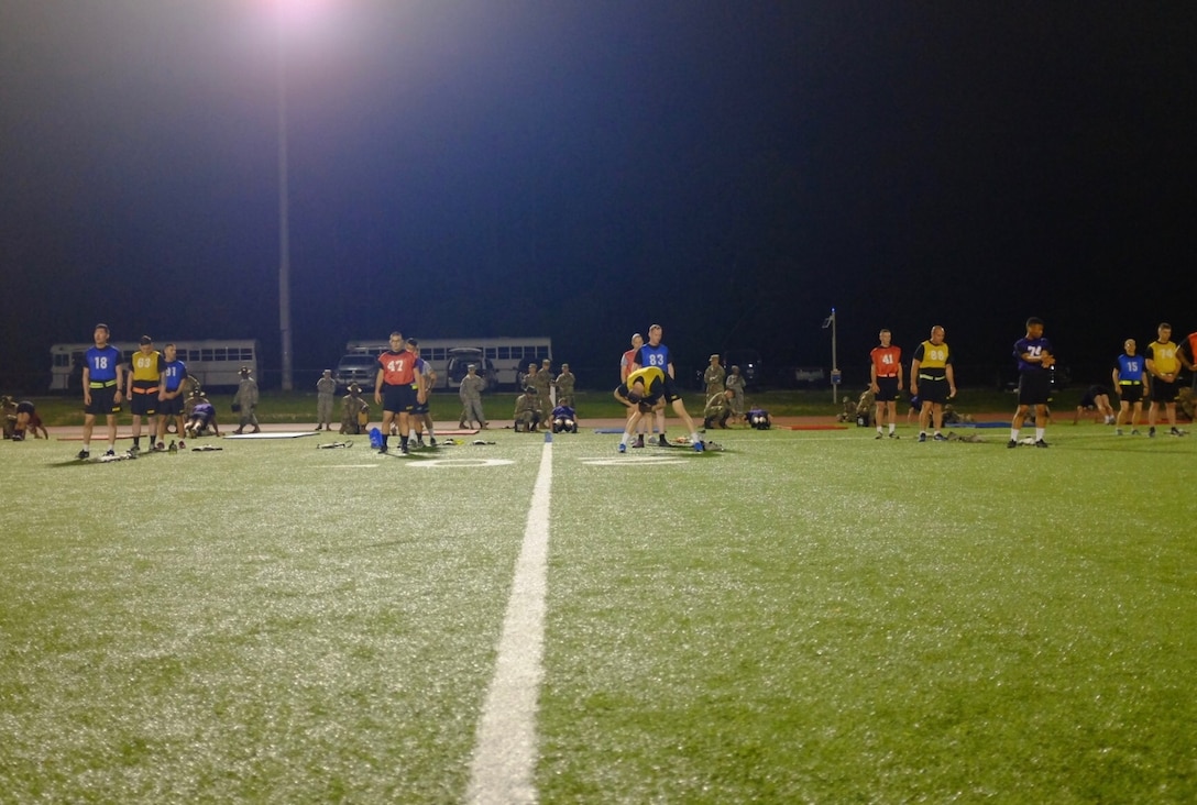 Warriors wait their turn during the push-up event during the Army Physical Fitness Test at the 2017 U.S. Army Reserve Best Warrior Competition at Fort Bragg, N.C., June 12. This year’s Best Warrior Competition will determine the top noncommissioned officer and junior enlisted Soldier who will represent the U.S. Army Reserve in the Department of the Army Best Warrior Competition later this year at Fort A.P. Hill, Va. (U.S. Army Reserve photo by Timothy L. Hale) (Released)