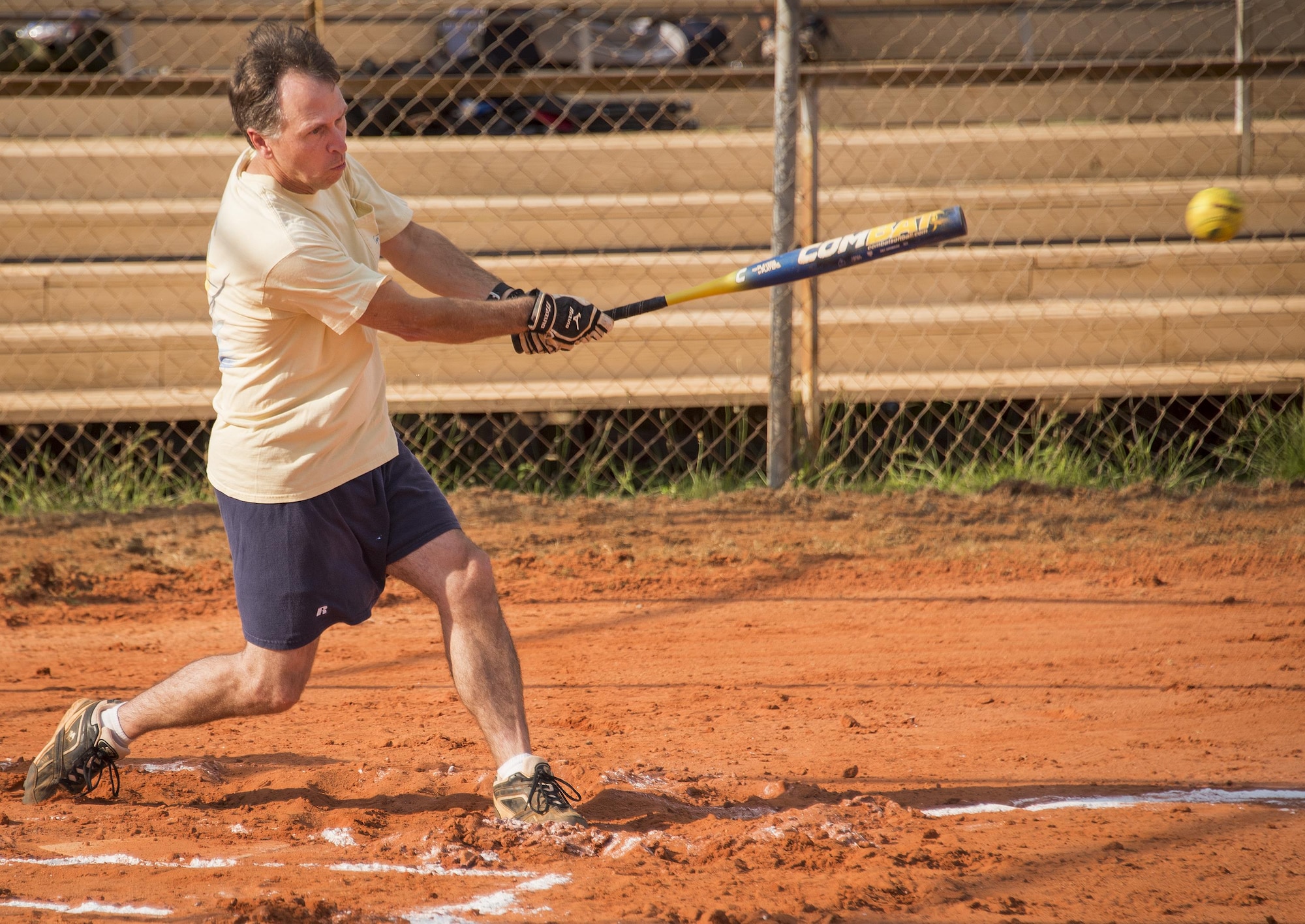 The Armament Directorate team’s Mike Kelton swings for the fences during an intramural softball game at Eglin Air Force Base, Fla., June 8.  The EB team bashed the hapless Air Force Research Lab team 14-4 in five innings of play.  (U.S. Air Force photo/Samuel King Jr.)