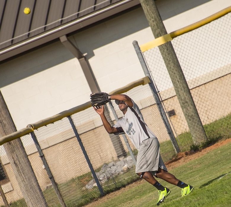 The Air Force Research Lab team’s Willie Whitley reaches up to catch a fly ball during an intramural softball game at Eglin Air Force Base, Fla., June 8.  The Armament Directorate team bashed the hapless AFRL team 14-4 in five innings of play.  (U.S. Air Force photo/Samuel King Jr.)