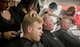 A group of firefighters receive a very close shave June 8 at Eglin Air Force Base, Fla.  Approximately 20 firefighters shaved their heads to raise awareness and funds for their crew mate, Terrance Curry, whose battled cancer continuously for 11 months.  (U.S. Air Force photo/Samuel King Jr.)