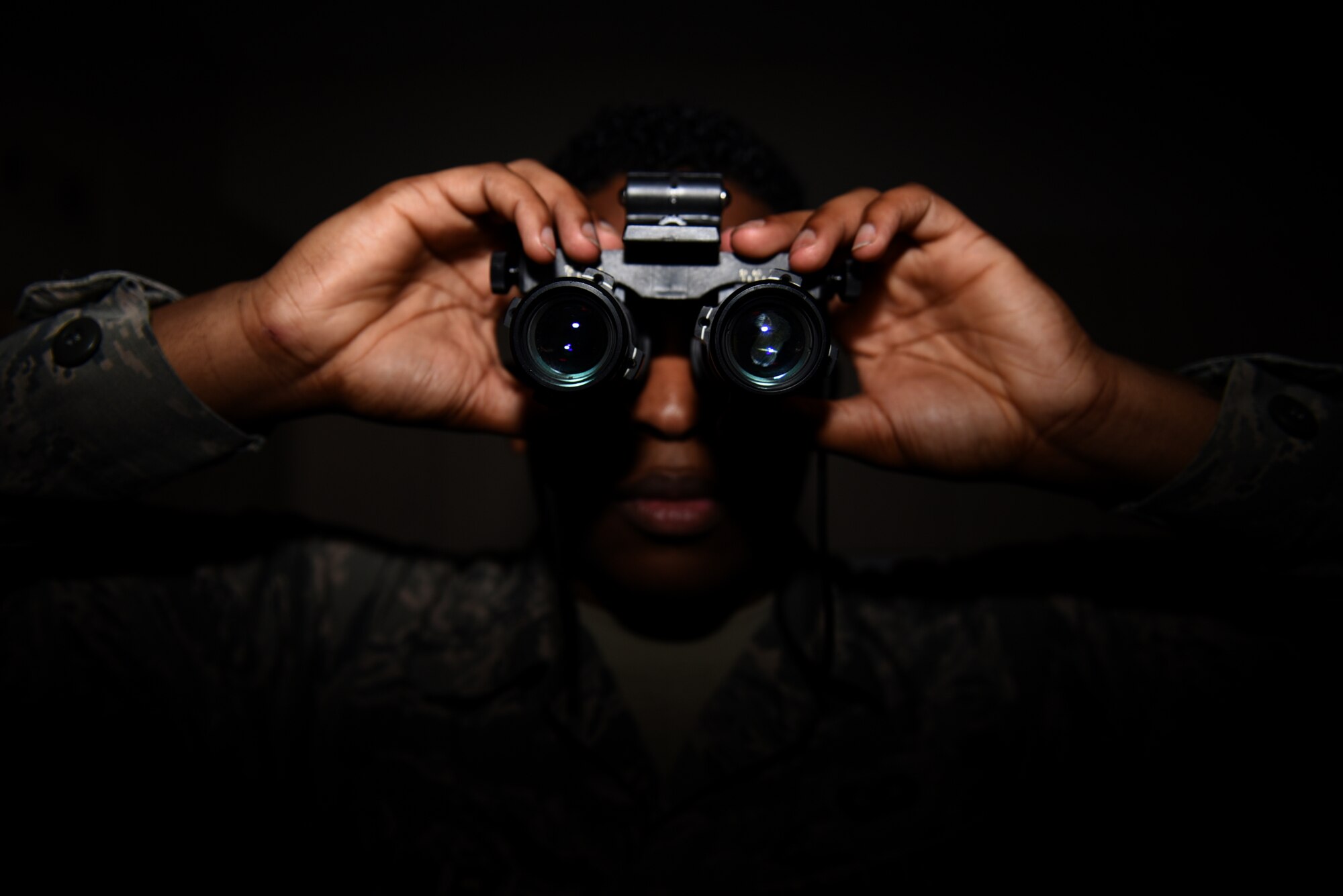 Airman 1st Class Justin Manley, 19th Operations Support Squadron Aircrew Flight Equipment apprentice, exams night vision goggles before distributing them to pilots June 9, 2017, at Little Rock Air Force Base, Ark. Each piece of equipment is carefully and meticulously prepared and inspected for any defects or malfunctions. (U.S. Air Force photo Airman 1st Class Kevin Sommer Giron)