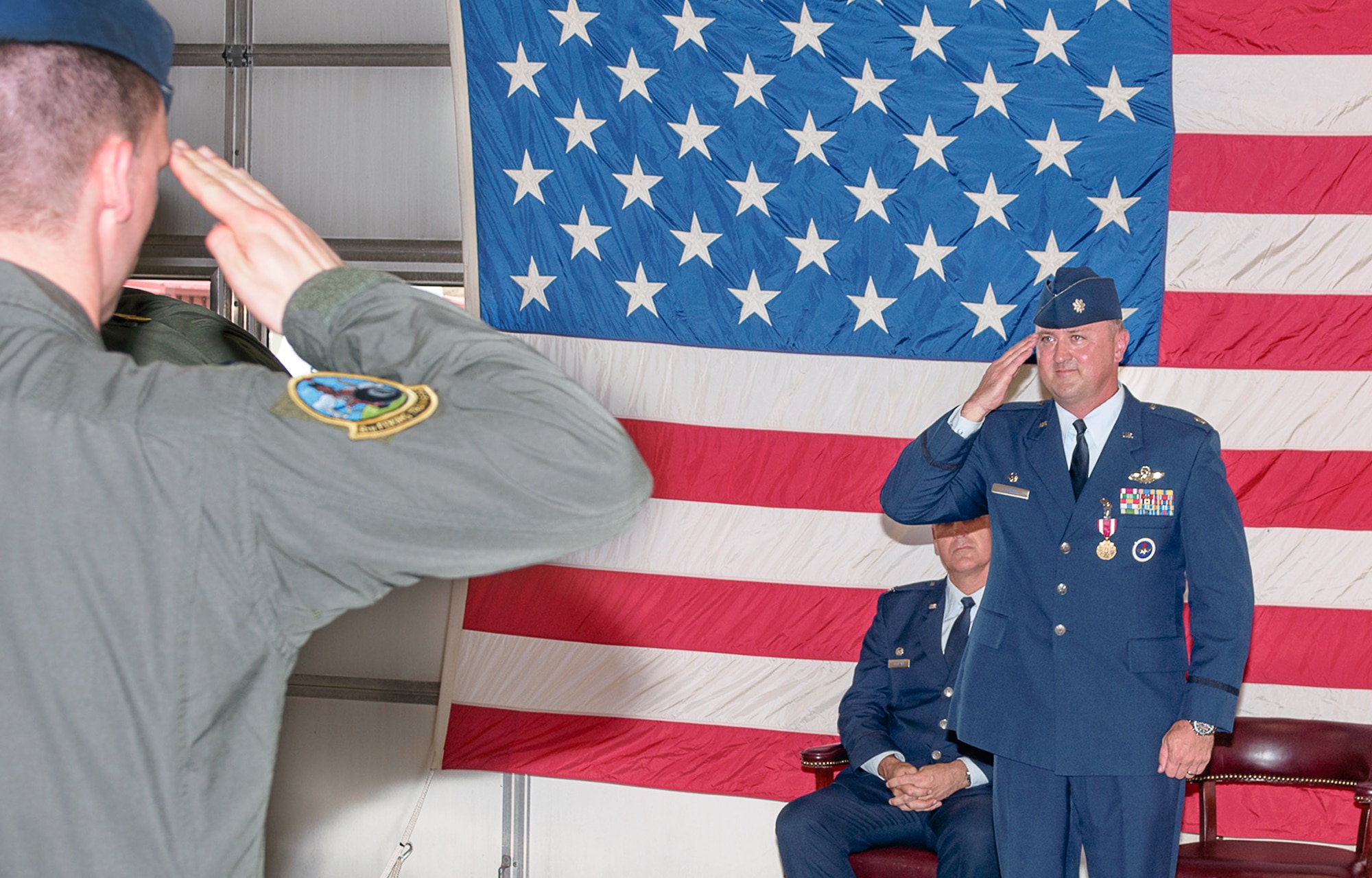 Lt. Col. Bryan Elder receives his final salute before relinquishing command of the 8th Flying Training Squadron to Lt. Col. Deirdre Gurry during a change-of-command ceremony June 9 at Vance Air Force Base, Oklahoma. (U.S. Air Force photo/ Terry Wasson)