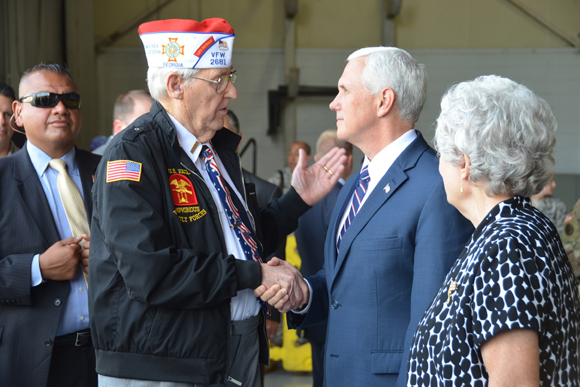 Vice President Mike Pence meets U.S. Navy Veteran Alan Hall and his wife Buena. Hall joined the Navy on his 17th birthday in 1943, and served in the U.S. Naval Amphibious Assault Forces during World War II and on the U.S.S. Brown DD 546 during the Korean War. (U.S. Air Force photo/Tech. Sgt. Kelly Goonan)