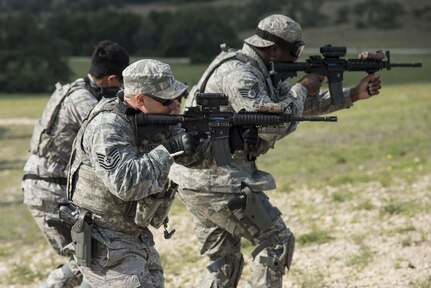 502nd Security and Readiness Group security forces Airmen take part in weapons training during Controlled FORCE Inc.’s force operator course June 9, 2017, at Joint Base San Antonio-Camp Bullis, Texas. The force operator course is designed to increase safety by helping students become more adept at close-range subject control. 