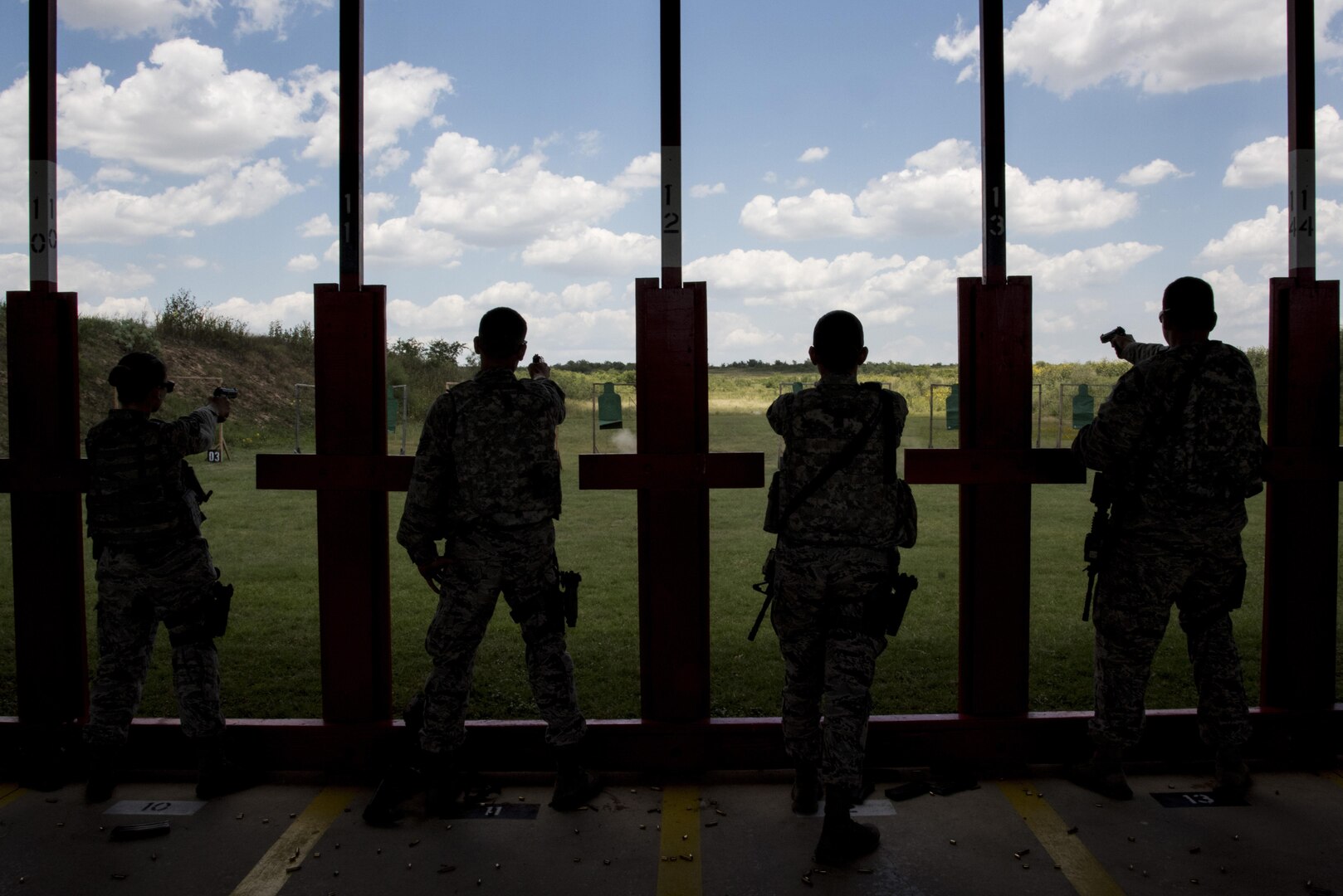 502nd Security and Readiness Group security forces Airmen take part in weapons training during Controlled FORCE Inc.’s force operator course June 7, 2017, at Joint Base San Antonio-Lackland Medina Training Annex, Texas. The force operator course is designed to increase safety by helping students become more adept at close-range subject control. 