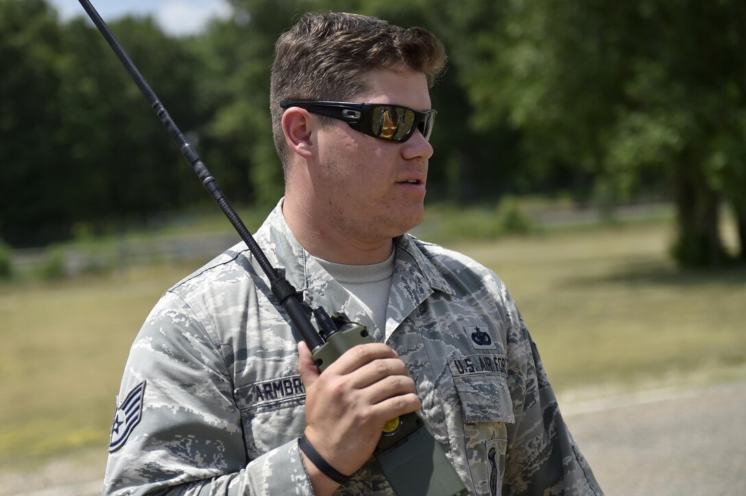 Staff Sgt. Steven Armbright, 821st Contingency Response Group security forces, responds to a simulated accident during Exercise Turbo Distribution 17-02, June 9, 2017, at Battle Creek Air National Guard Base, Mich.  Turbo Distribution is used to evaluate mobility operations and expeditionary combat support. Unlike traditional, simulation based exercises, TD provides a dynamic venue with scenarios designed to challenge participants executing complex operations in a deployed environment.  (U.S. Photo by Tech. Sgt. Liliana Moreno/Released)