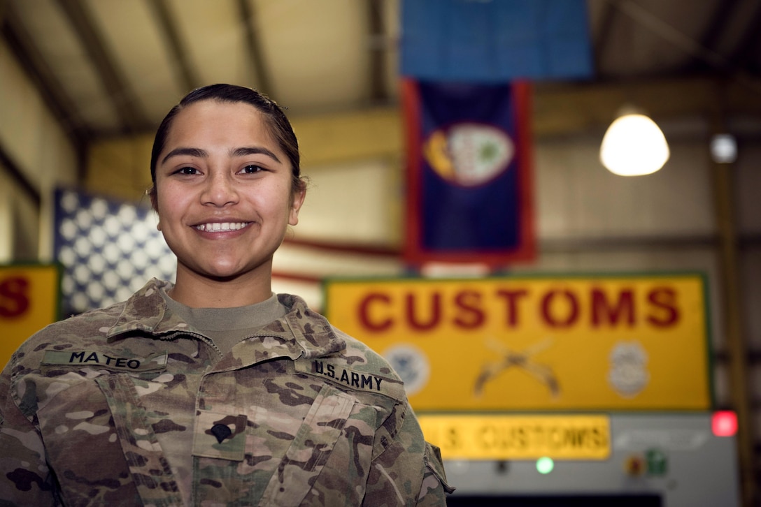 U.S. Army Spc. Michelle Mateo is deployed to Bagram Airfield, Afghanistan, as a customs agent for the base. She is assigned to the 368th Military Police Company, which is located on Guam, a 210-square-mile island in the middle of the Pacific Ocean. As a customs agent, Mateo inspected personnel and cargo leaving Afghanistan and the Central Command area of responsibility. (U.S. Air Force photo by Staff Sgt. Benjamin Gonsier)