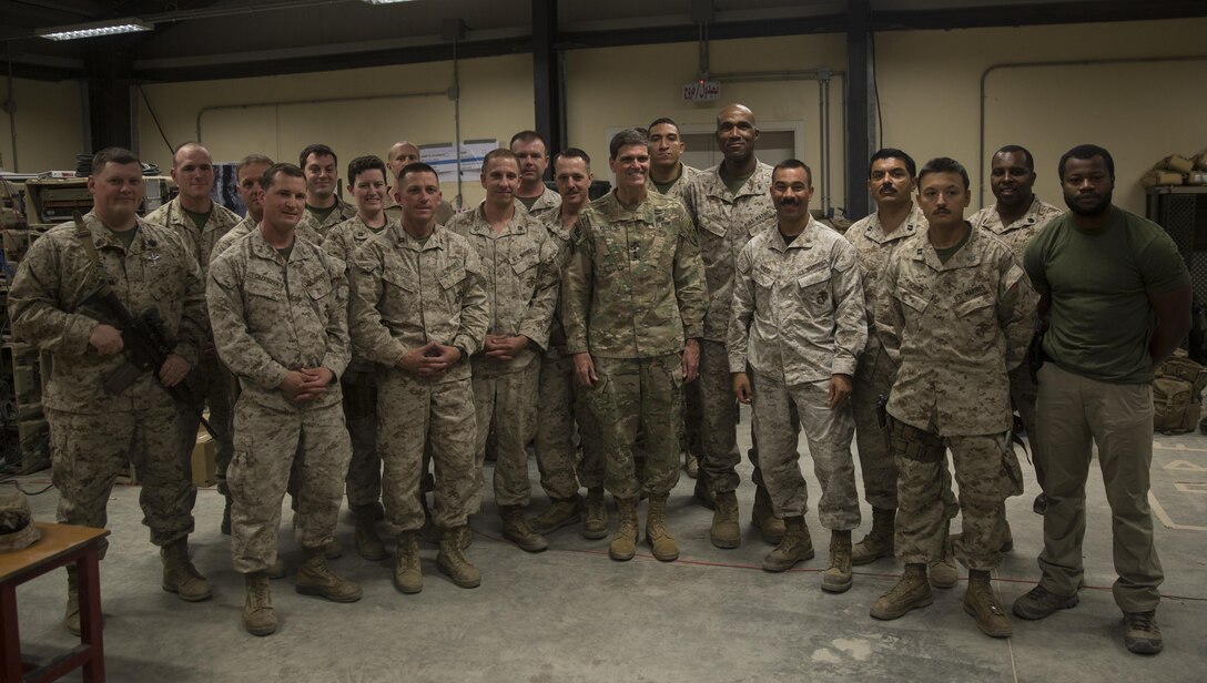 General Joseph Votel, commander of U.S. Central Command, poses for a picture with the U.S. Marine advisors with Task Force Southwest at Bost Airfield, Afghanistan, June 2, 2017. The general visited Bost as part of his battle circulation in Helmand Province. Task Force Southwest, comprised of approximately 300 Marines and Sailors from II Marine Expeditionary Force, is training, advising and assisting the Afghan National Army 215th Corps and the 505th Zone National Police. (U.S. Marine Corps photo by Sgt. Justin T. Updegraff)
