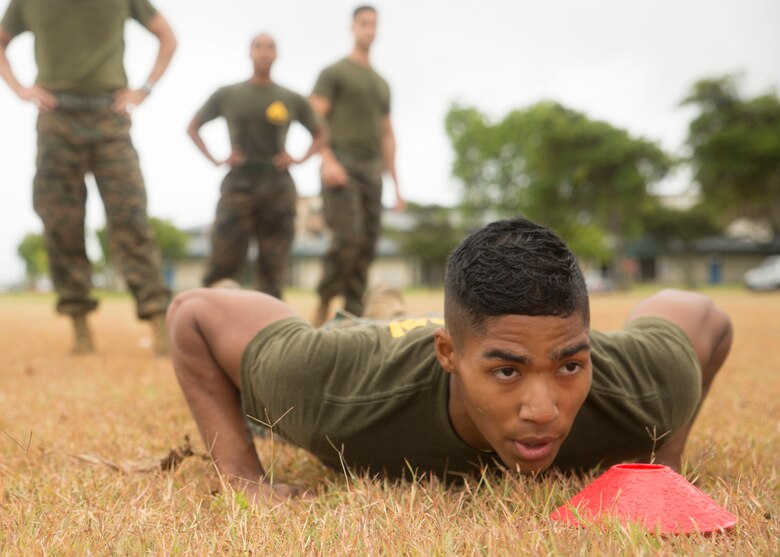 Cpl. Teilan Bowens, an Embarkation Clerk with Light Attack Helicopter Squadron 367, participates in the Force Fitness Program demonstration on Marine Corps Base Hawaii June 8, 2017. This drill worked on Bowens’ explosive speed and agility, simulating a maneuver under fire. (Photo by Lance Cpl. Luke Kuennen)