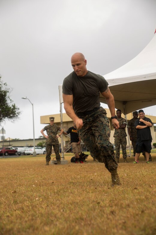 The Sergeant Major of Light Attack Helicopter Squadron 367, Sgt. Maj. David Elliot, participates in the Force Fitness Program demonstration on Marine Corps Base Hawaii June 8, 2017. This drill worked on Elliot’s explosive speed and agility, simulating a maneuver under fire. (Photo by Lance Cpl. Luke Kuennen)
