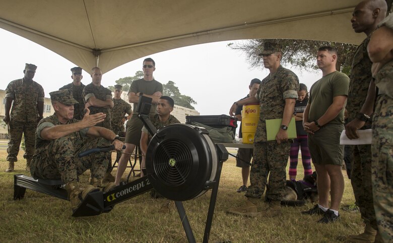 Lt. Col. Paul Melchior, the Force Fitness division action officer, demonstrates the proper form when using the rowing machine at the Force Fitness Instructor Promotion Tour on Marine Corps Base Hawaii June 8, 2017. The rowing machine will supplement the 3-mile run portion of the Physical Fitness Test for Marines on light or limited duty, as well as presenting an option for Marines older than 46. (Photo by Lance Cpl. Luke Kuennen)