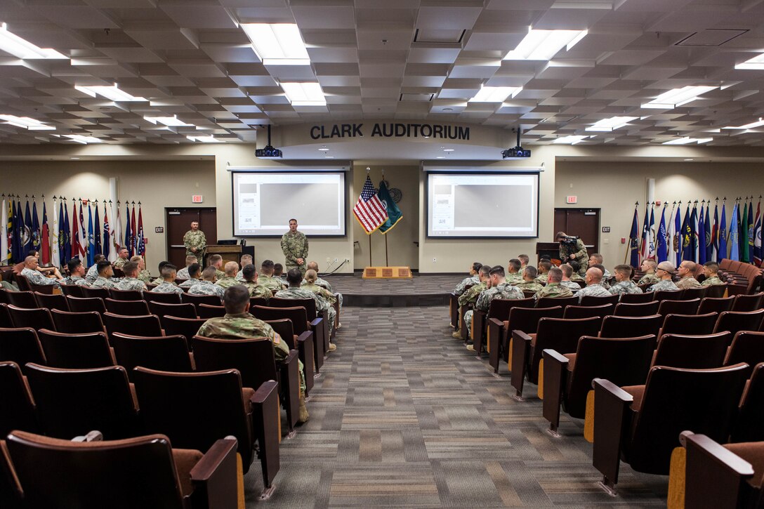 Sgt. 1st Class Joshua Moeller, winner of the 2016 Department of the Army and U.S. Army Reserve Best Warrior Competition while assigned to D Company, 2nd Battalion, 413th Infantry Regiment, 2nd Brigade, 95th Division, 108th Training Command, currently working at the office of the Sergeant Major of the Army Headquarters, Pentagon, Washington D.C., briefs Warriors competing at the 2017 U.S. Army Reserve Best Warrior Competition at Fort Bragg, N.C., June 12. This year’s Best Warrior Competition will determine the top noncommissioned officer and junior enlisted Soldier who will represent the U.S. Army Reserve in the Department of the Army Best Warrior Competition later this year at Fort A.P. Hill, Va. (U.S. Army Reserve photo by Spc. Lisa Velazco) (Released)