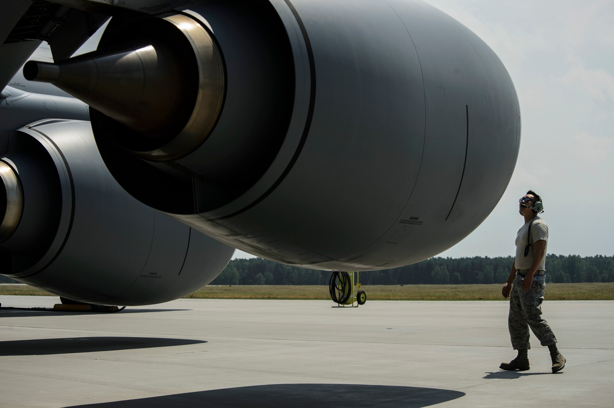 Tech. Sgt. Min An, 459th Aircraft Maintenance Squadron crew chief, is part of the Total Force Citizen Airmen team conducts a visual inspection of a KC-135R Stratotanker during BALTOPS exercise at Powidz Air Base, Poland, June 12, 2017. The exercise is designed to enhance flexibility and interoperability, to strengthen combined response capabilities, as well as demonstrate resolve among Allied and Partner Nations' forces to ensure stability in, and if necessary defend, the Baltic Sea region. (U.S. Air Force photo by Staff Sgt. Jonathan Snyder)