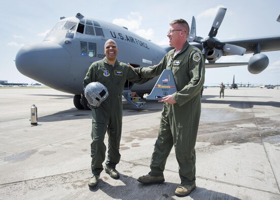 Minnesota Air National Guard's Assistant Adjutant General, Air, Brig. Gen. David Hamlar Jr. took his ceremonial final flight at the 133rd Airlift Wing in St. Paul, Minn., June 9, 2017. Hamlar received the traditional "all washed up" treatment upon touching the ground from awaiting crew, family and friends. (U.S. Air National Guard photo by Tech. Sgt. Austen R. Adriaens/Released)