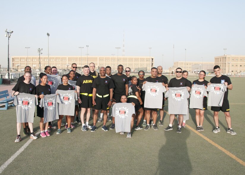 Soldiers of the 369th Special Troops Battalion pose for a photo following the inaugural Harlem Hellfighter 5K run, held at Camp Arifjan, Kuwait on June 2, 2017. The event was held to celebrate the 104th anniversary of the formation of the historic New York National Guard unit. The unit was given their historic nickname “Hellfighters” by their German opponents in WWI for their remarkable prowess on the battlefield. (U.S. Army photo by Sgt. Jeremy Bratt)