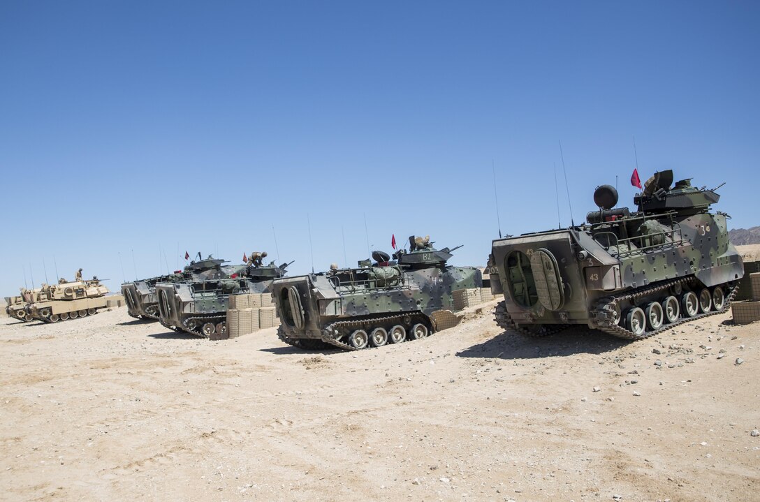 MARINE CORPS AIR GROUND COMBAT CENTER TWENTYNINE PALMS, California – Marines with 2nd Combat Engineer Battalion and 3rd Assault Amphibian Battalion conduct a live-fire exercise at Range 106A aboard Marine Corps Air Ground Combat Center, Twentynine Palms, California on May 4, 2017. Marines with the ground combat element of Marine Air Ground Task Force 3 conducted a live-fire shoot to prepare their weapon systems for Integrated Training Exercise 3-17. Integrated Training Exercise is a training evolution conducted five times a year to enhance the lethality and co-operability between the four elements of a MAGTF. (U.S. Marine Corps photo by Cpl. Jesus Sepulveda Torres)