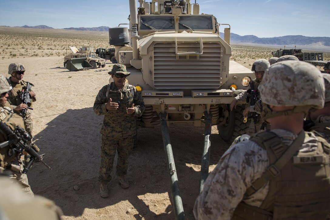 MARINE CORPS AIR GROUND COMBAT CENTER TWENTYNINE PALMS, California – Sgt. James Elg, an instructor with Tactical Training Exercise Control Group, instructs Marines with 2nd Combat Engineer Battalion on installing a tow mount on a Mine Resistant Ambush Protected vehicle at the vehicle recovery lane aboard Marine Corps Air Ground Combat Center, Twentynine Palms, California, May 3, 2017. Part of Integrated Training Exericse 3-17, Marines with the logistics combat element of Marine Air Ground Task Force 3 conducted vehicle recovery training by towing and lifting simulated vehicles. ITX is a training evolution conducted five times a year to enhance the lethality and co-operability between the four elements of a MAGTF. (U.S. Marine Corps photo by Cpl. Jesus Sepulveda Torres)