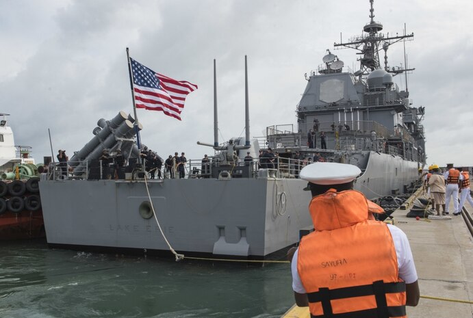 Sailors aboard the Ticonderoga-class guided-missile cruiser USS Lake Erie (CG 70) and their counterparts from the Sri Lankan Navy work together to secure mooring lines as the ship arrives in Colombo, Sri Lanka, June 11 to support humanitarian assistance operations in the wake of severe flooding and landslides that devastated many regions of the country. Recent heavy rainfalls brought by a southwestern monsoon triggered flooding and landslides throughout the country, displacing thousands of people and causing significant damage to homes and buildings. 