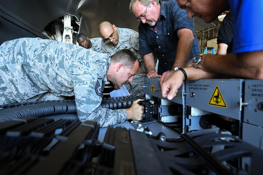 388th Maintenance Group Loading Standardization Crew Member Master Sgt. Ryan Hanner attaches the chute to an ammunition bulk loader used to load cannon rounds onto the F-35A Lightning II fighter aircraft, Hill Air Force Base, Utah, June 7, 2017. (U.S. Air Force photo/R. Nial Bradshaw)