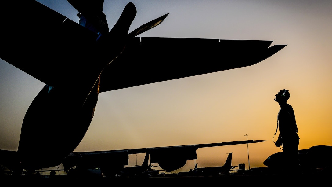 An Air Force maintainer inspects the boom of a KC-135 Stratotanker at Al Udeid Air Base, Qatar, June 7, 2017, before a flight supporting Operation Inherent Resolve. The maintainer is assigned to the 340th Aircraft Maintenance Unit. Air Force photo by Staff Sgt. Michael Battles