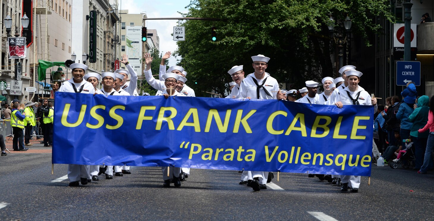 PORTLAND, Ore. (June 10, 2017) – Sailors assigned to the submarine tender USS Frank Cable (AS 40) march in the Grand Floral Parade during Rose Festival Fleet Week in Portland, Ore., June 10. The festival and Portland Fleet Week are a celebration of the sea services with Sailors, Marines and Coast Guard members from the U.S. and Canada making the city a port of call.  (U.S. Navy photo by Mass Communication Specialist 1st Class Eva-Marie Ramsaran/Released)